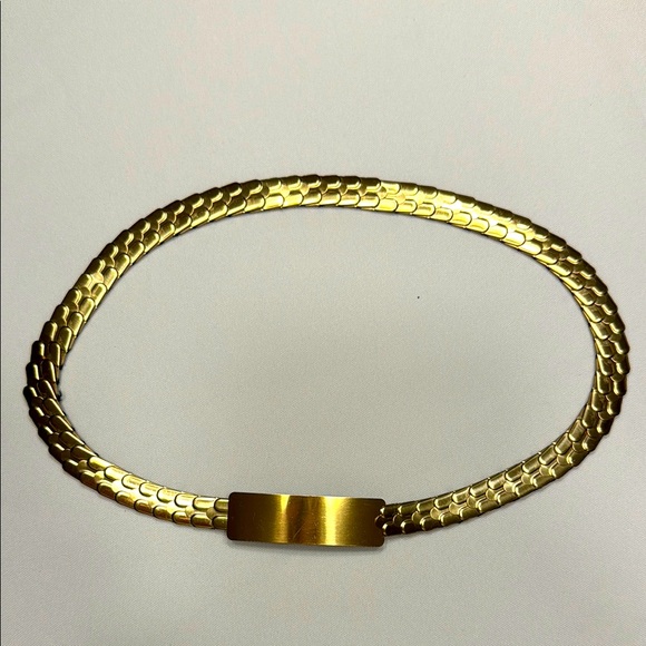 Accessories - Vtg 80’s Gold Tone narrow stretch belt.